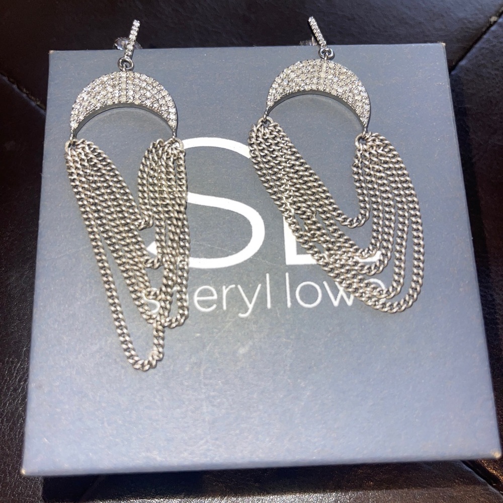 Sheryl Lowe Diamond and sterling earrings new without tags. Paid 1795.00.